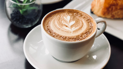 Can drinking too much coffee lead to an upset stomach?