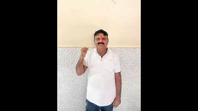 Ex-zila parishad member held for firing near pandal