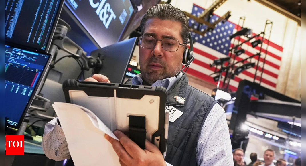 US stocks today: Wall Street holds near record highs as investors await Tesla earnings