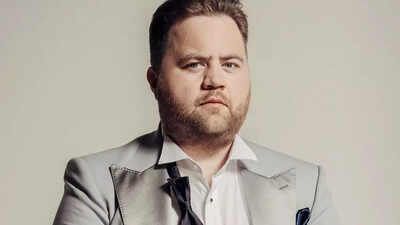 Actor Paul Walter Hauser talks who he wants as Lorne Michaels in the upcoming Chris Farley biopic