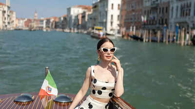 Emily in Paris' fifth season teaser has fans buzzing over Gabriel's absence, sparking romance theories. Lucas Bravo remains coy about his role. The upcoming season shifts focus to a "tale of two cities," with Emily exploring both Paris and Rome, promising new adventures and familiar faces.  Fans spot Gabriel missing as Lucas Bravo clarifies, 'I won’t say anything'