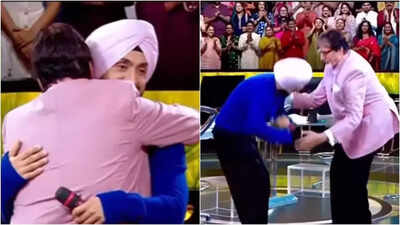 Diljit Dosanjh bows down to touch Amitabh Bachchan’s feet before the duo greets each other with a hug; Big B calls him ‘Punjab Da Puttar’ | – The Times of India Diljit Dosanjh bows down to touch Amitabh Bachchan’s feet before the duo greets each other with a hug; Big B calls him ‘Punjab Da Puttar’ | – The Times of India