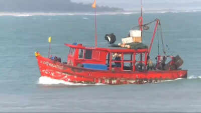 A fishing trawler returns from the sea to Paradip Cyclone Montha forces marine fishermen in Kendrapada and Jagatsinghpur to anchor boats