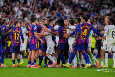 Real Madrid and Barcelona players get into a scuffle after the full time whistle at the Santiago Bernabeu (AP Photo/Manu Fernandez) Real Madrid end El Clasico woes with 2-1 victory over Barcelona at Santiago Bernabeu