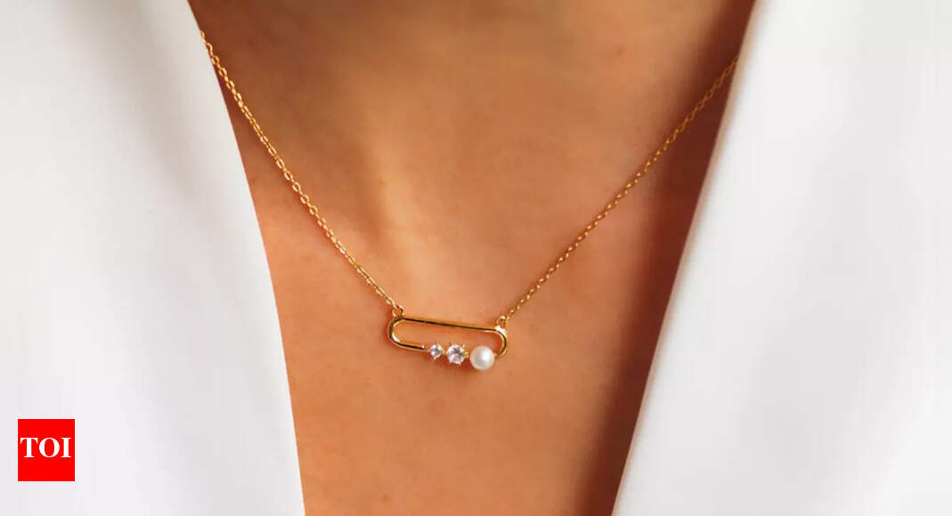 Why is everyone suddenly wearing safety pin pendant necklaces?