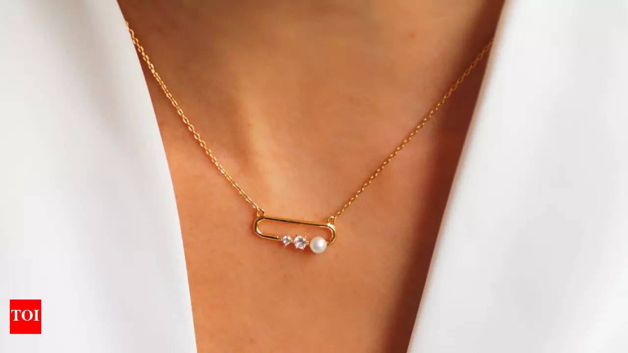 Why is everyone suddenly wearing safety pin pendant necklaces? | - The  Times of India