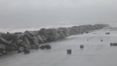 Kakinada-Uppada beach road (ANI photo)  Sea turns rough off Kakinada-Uppada beach along Andhra coast amid strong winds - watch video