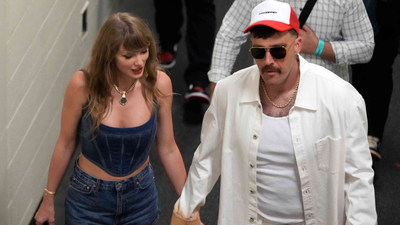 Taylor Swift's wedding dress concepts spark panic.(Image via Ed Zurga/AP Images)  Taylor Swift's wedding dress concepts spark outrage as she plans her lavish wedding with Travis Kelce