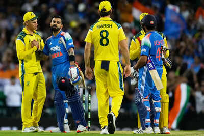 India's not out batters Virat Kohli, second left, and Rohit Sharma, right, shake hands with Australian players after their One Day International cricket match in Sydney, Australia, Saturday, Oct. 25, 2025. (AP)  What is India's T20 record against Australia Down Under?