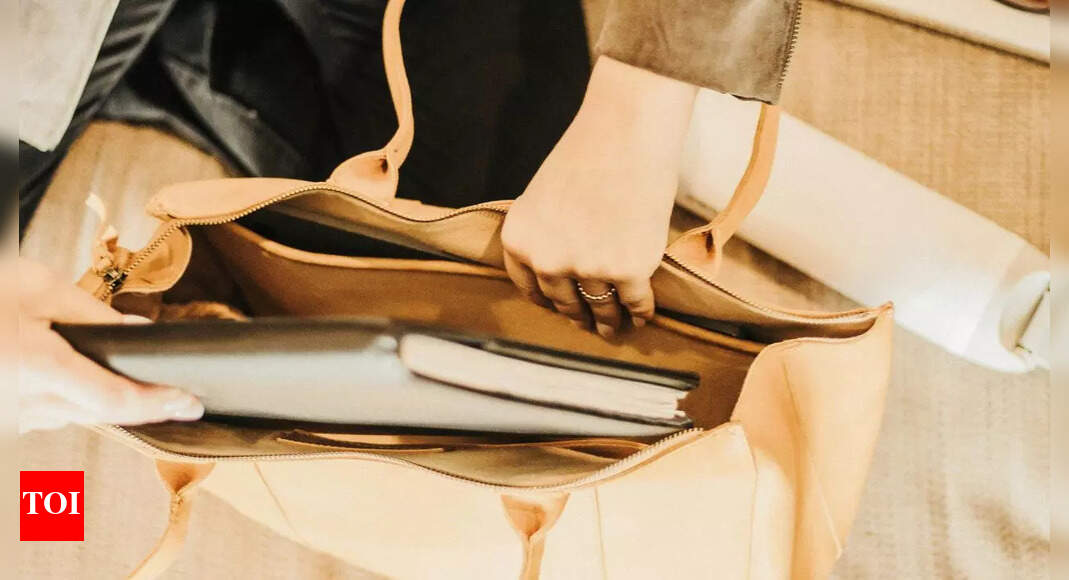 How your everyday tote bag could be causing back and shoulder pain