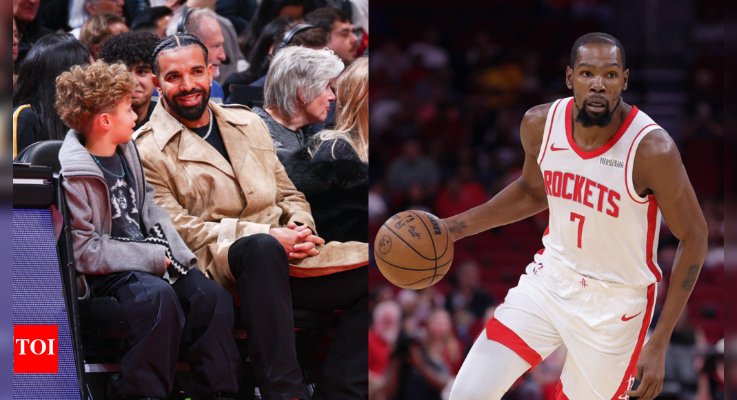 Drake pulls up courtside and shares a moment with Kevin Durant during the Toronto Raptors vs Houston Rockets match