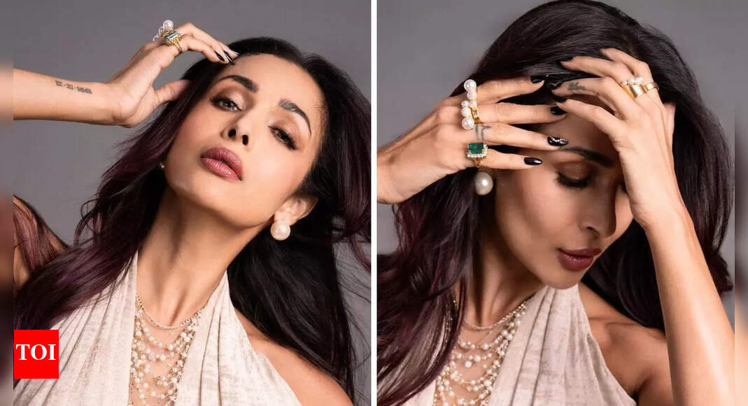Malaika Arora looks glamorous in a draped pearl gown that comes attached with staggering price tag of Rs 1.05 lac