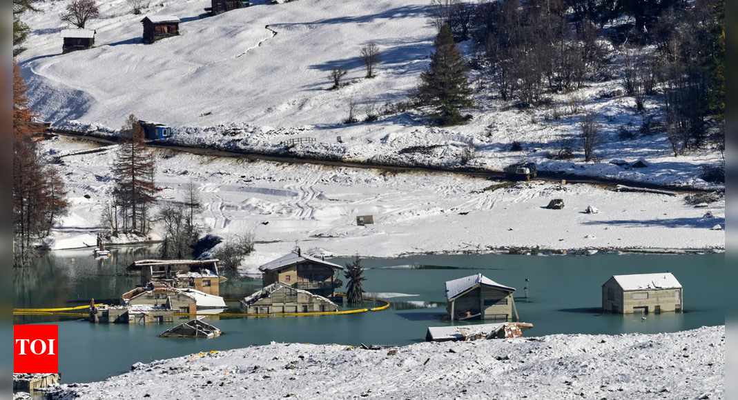 Residents of Swiss village swallowed by mudslide work to rebuild for return home Residents of Swiss village swallowed by mudslide work to rebuild for return home