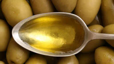 What happens to your digestion when you take a spoonful of olive oil daily
