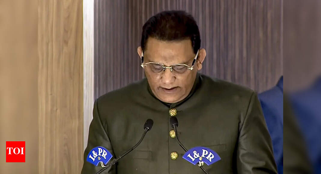 Former India cricket captain Mohammad Azharuddin sworn in as minister in Telangana's cabinet