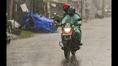 A motorcyclist rides through a road amid rain triggered by Cyclone Montha, in Nadia, West Bengal. (PTI) Cyclone Montha weakens over Chhattisgarh; IMD issues orange alert for heavy rain in north Bengal