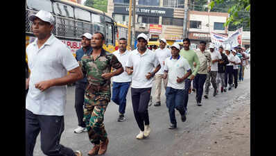 Police personnel take part in a run in Ranchi Ranchi Celebrates Sardar Vallabhbhai Patel's 150th Birth Anniversary with 'Run for Unity'