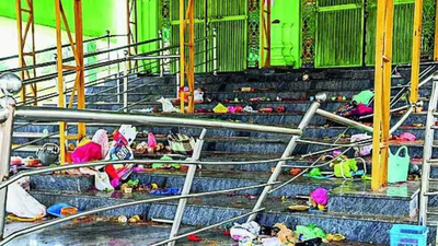 9 die in stampede at packed Andhra temple on festival ; with no prior approval, temple overwhelmed by festival crowd