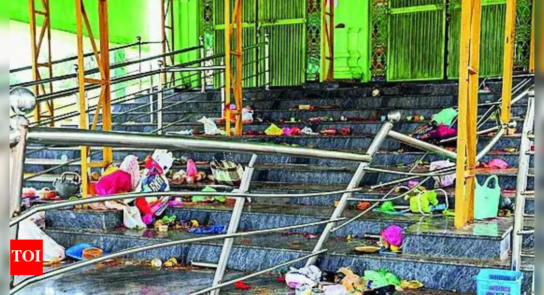 9 die in stampede at packed Andhra temple on festival ; with no prior approval, temple overwhelmed by festival crowd