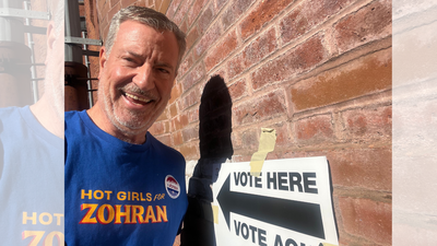 Former NYC mayor Bill de Blasio votes for Mamdani wearing viral ‘Hot Girls for Zohran’ T-shirt — see photo
