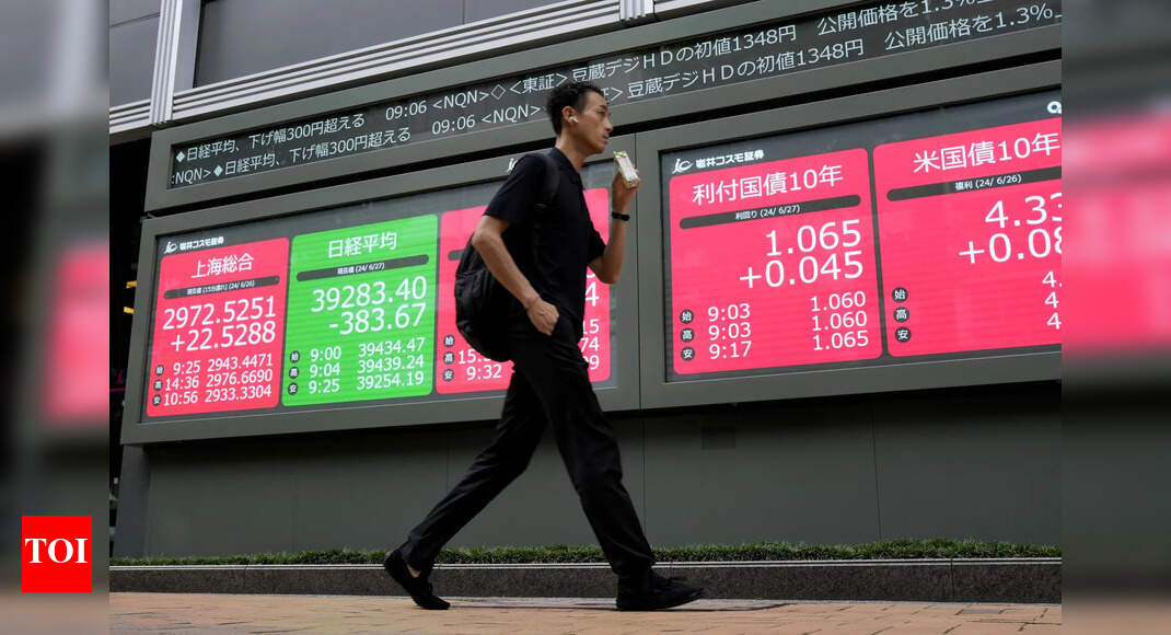 Asian stocks today: Markets track Wall Street losses; HSI falls over 240 points, Kospi dips 2.4% – The Times of India