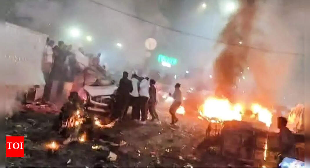 Delhi blast: 9 killed in explosion; top cop says slow-moving car burst into flames at traffic signal