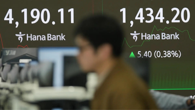  Asian stocks rise as US shutdown nears end; oil prices stay under pressure