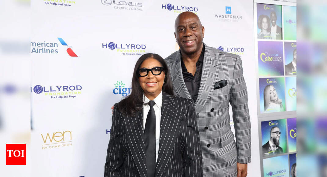 Magic Johnson and his wife Cookie posed with their longtime friends while enjoying a fun night