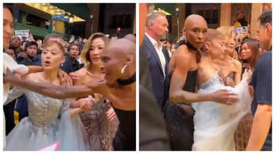  Cynthia Erivo protects Ariana Grande after fan breaches barricade and GRABS singer at Singapore premiere