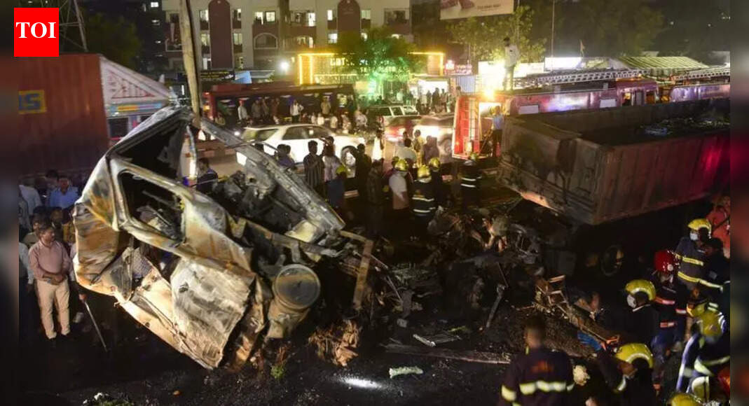 8 dead, 13 hurt as car gets crushed between 2 trucks in flames near ...