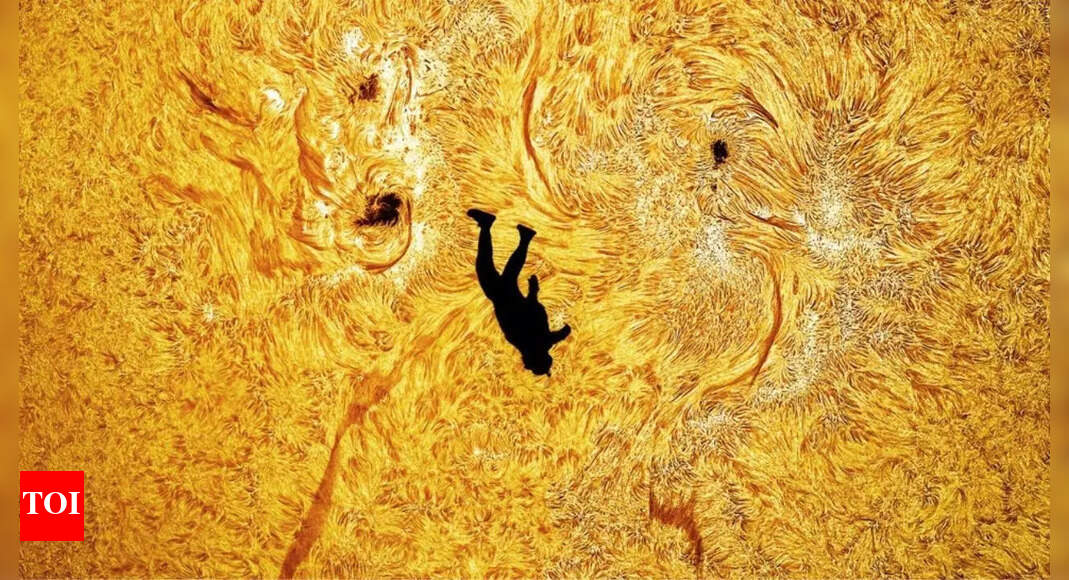 'Modern Icarus': Skydiver falls across the sun in a mind-bending astrophotography illusion