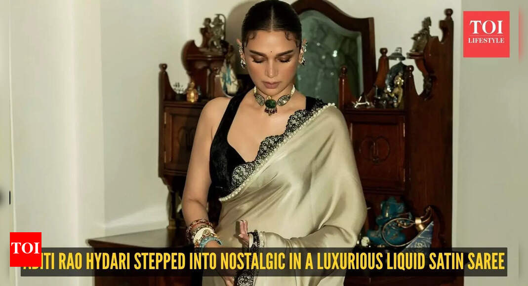 Aditi Rao Hydari just evoked old-world charm in this stunning liquid satin saree by Manish Malhotra