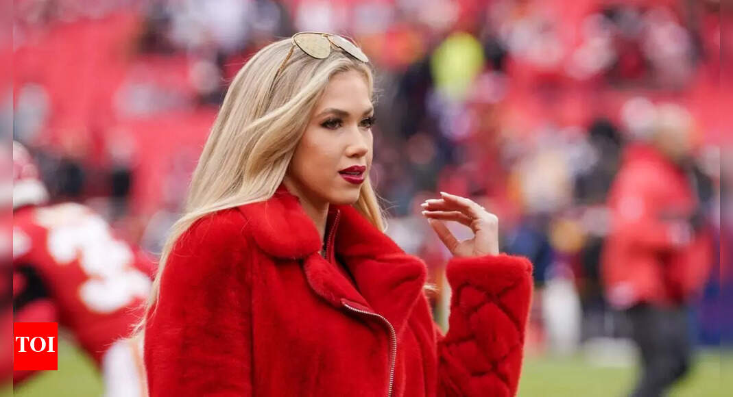 Chiefs heiress Gracie Hunt turns Mile High heads with bold red game-day coat at Broncos clash