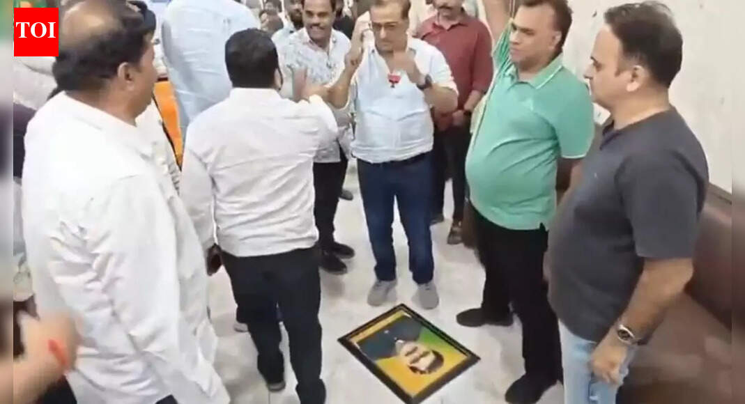 BJP issues show-cause notice to party worker after photo of former corporator who left party was blackened