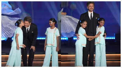 shah-rukh-khans-cute-moment-with-his-young-fans-from-the-global-peace-honours-2025-stage-goes-viral.jpg