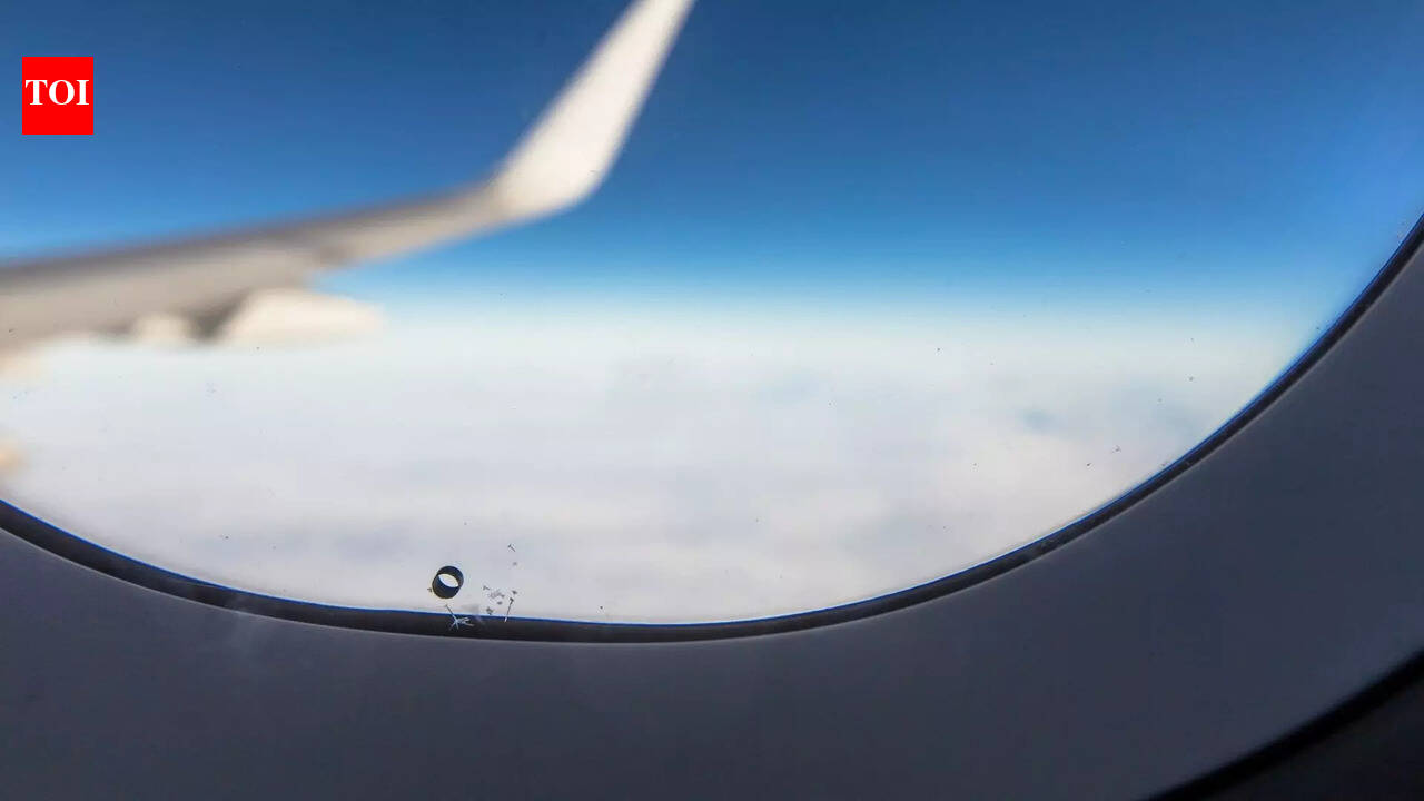 Why airplane windows have a tiny hole