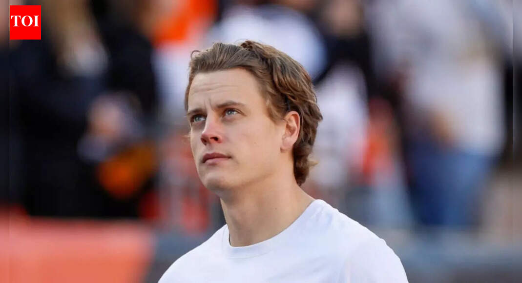 Cincinnati Bengals QB Joe Burrow gifts a game ball to a young girl in the NFL stands after winning the Madden Thanksgiving MVP