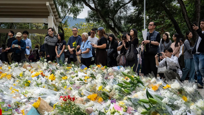 Hong Kong fire: Citizens' anger over 146 deaths spills on to streets, demand fair probe; China slaps sedition law