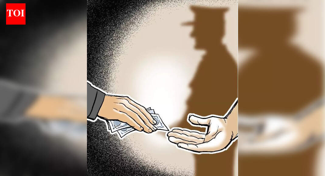 Revenue employee held on bribe charge after 1km chase