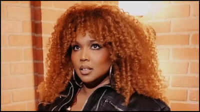 Lizzo claps back at trolls for body-shaming jokes; says, 'mind ur business'