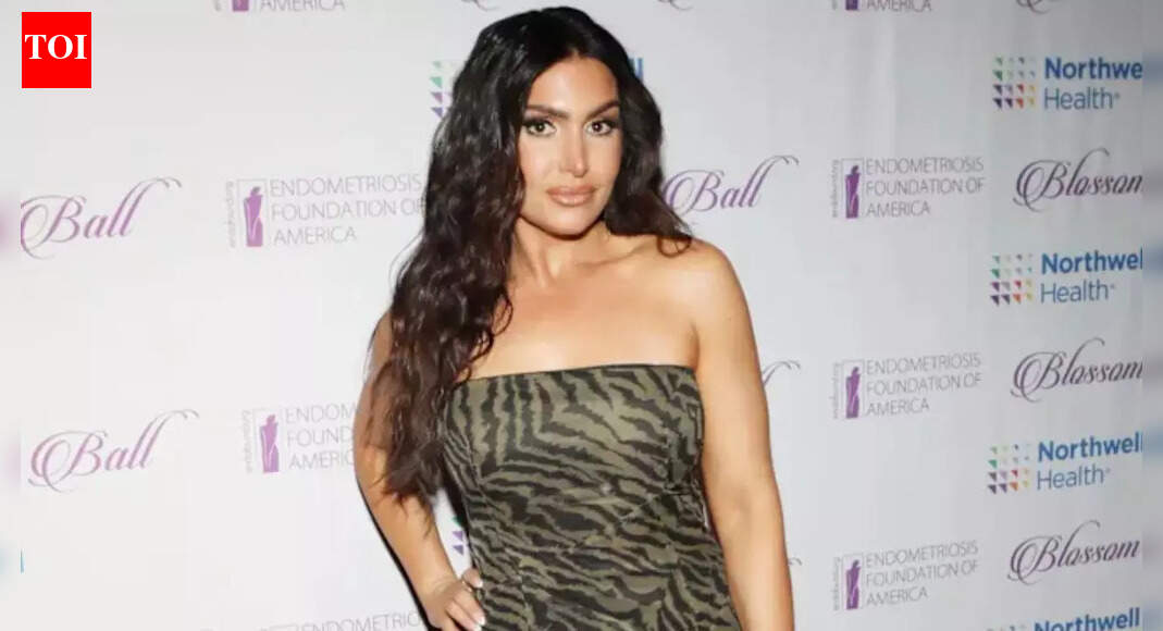 Former ‘First Take’ star Molly Qerim turns heads in Abu Dhabi as her glamorous F1 race-day look proves she’s a style icon off-camera