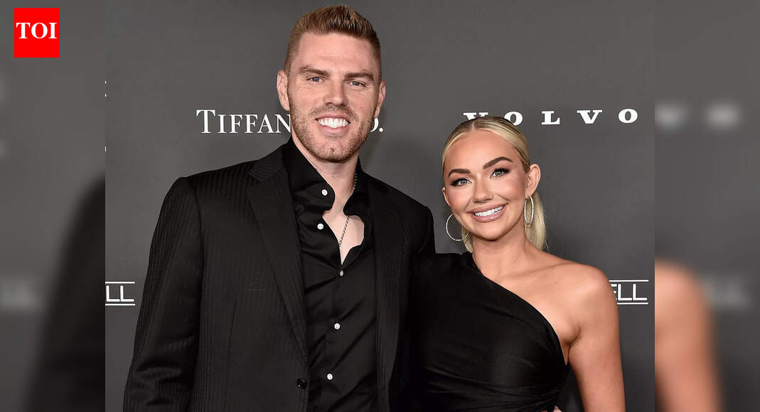 Freddie Freeman and wife Chelsea enjoy a festive night out with Emma Roberts as their holiday look grabs attention