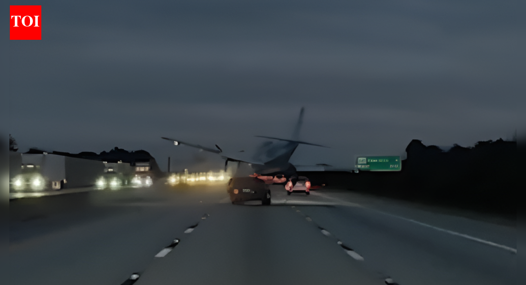 Small plane crash-lands on Florida freeway; hits car - watch video