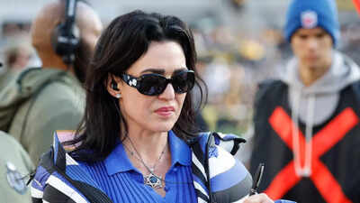 Colts owner Carlie Irsay-Gordon steps out in bold fit as she evaluates 44-year-old Philip Rivers on the field