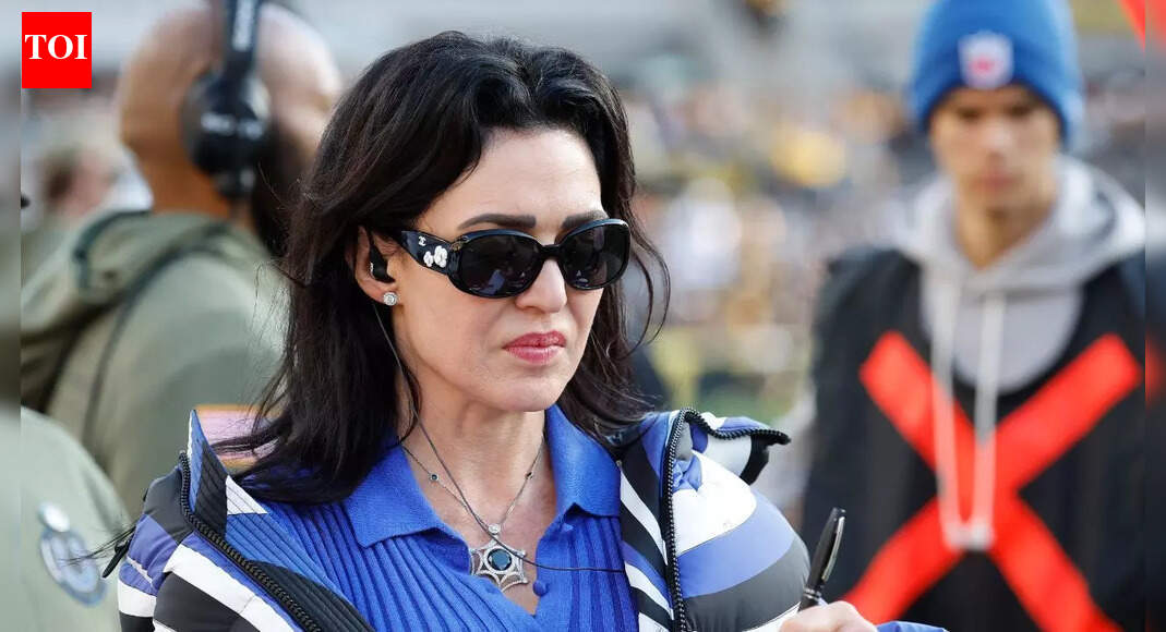 Colts owner Carlie Irsay-Gordon steps out in bold fit as she evaluates 44-year-old Philip Rivers on the field