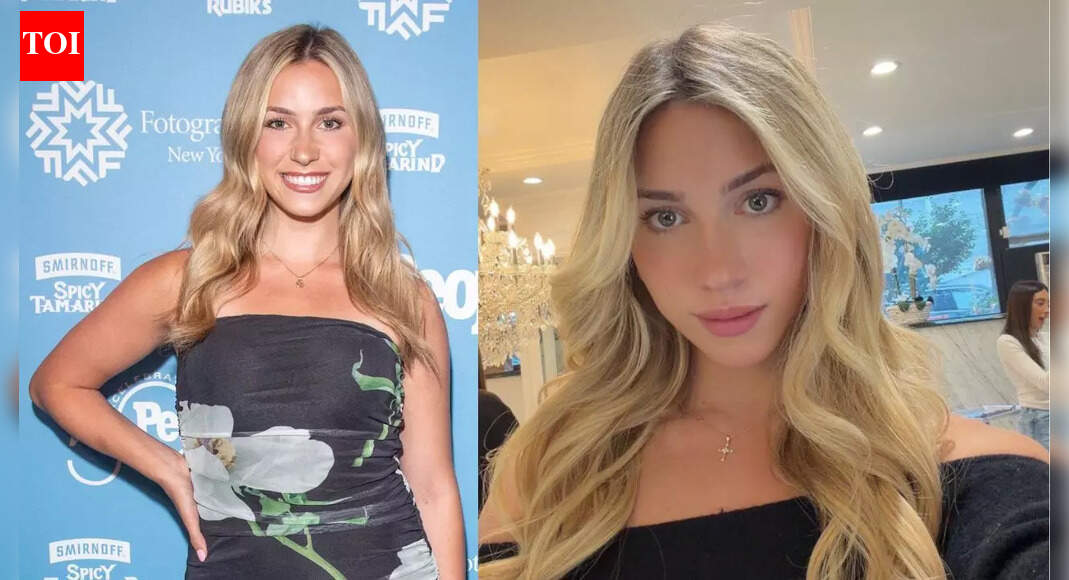 ESPN influencer Katie Feeney steals the spotlight posing with the Heisman Trophy in eye-catching knee-high boots