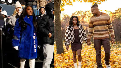 Simone Biles turns heads in luxury blue fur coat as she supports husband Jonathan Owens at chilly game