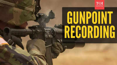 Chicago resident says federal agent pointed gun at her while filming immigration enforcement