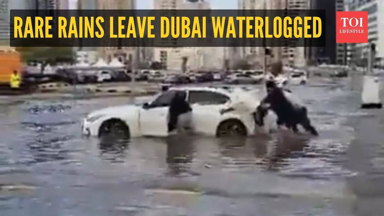 Rare rains leave Dubai waterlogged: Viral clips show streets flooded after  heavy rains - The Times of India