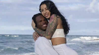 Travis Hunter’s wife Leanna turns heads in chic white bikini selfie during family birthday celebration